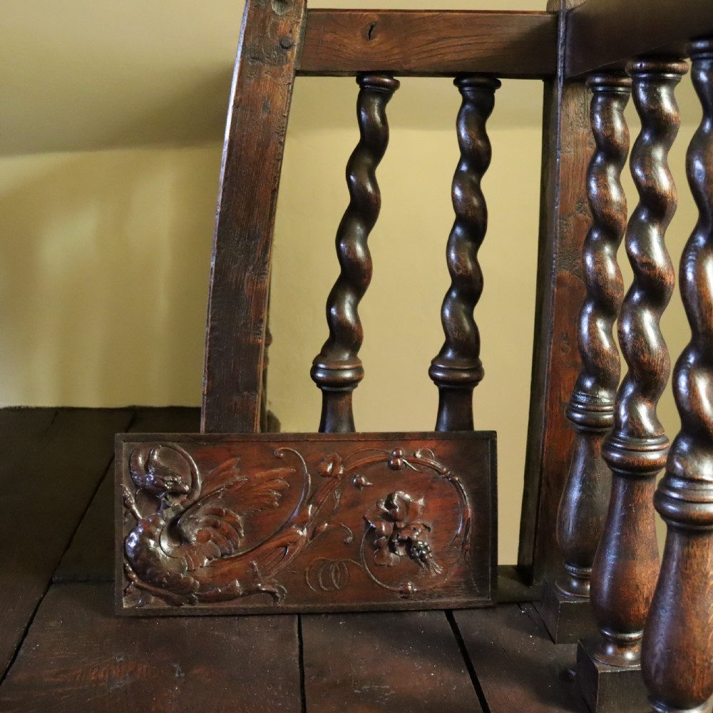 A 19th century carved walnut wall panel depicting a Wyvern or dragon View II