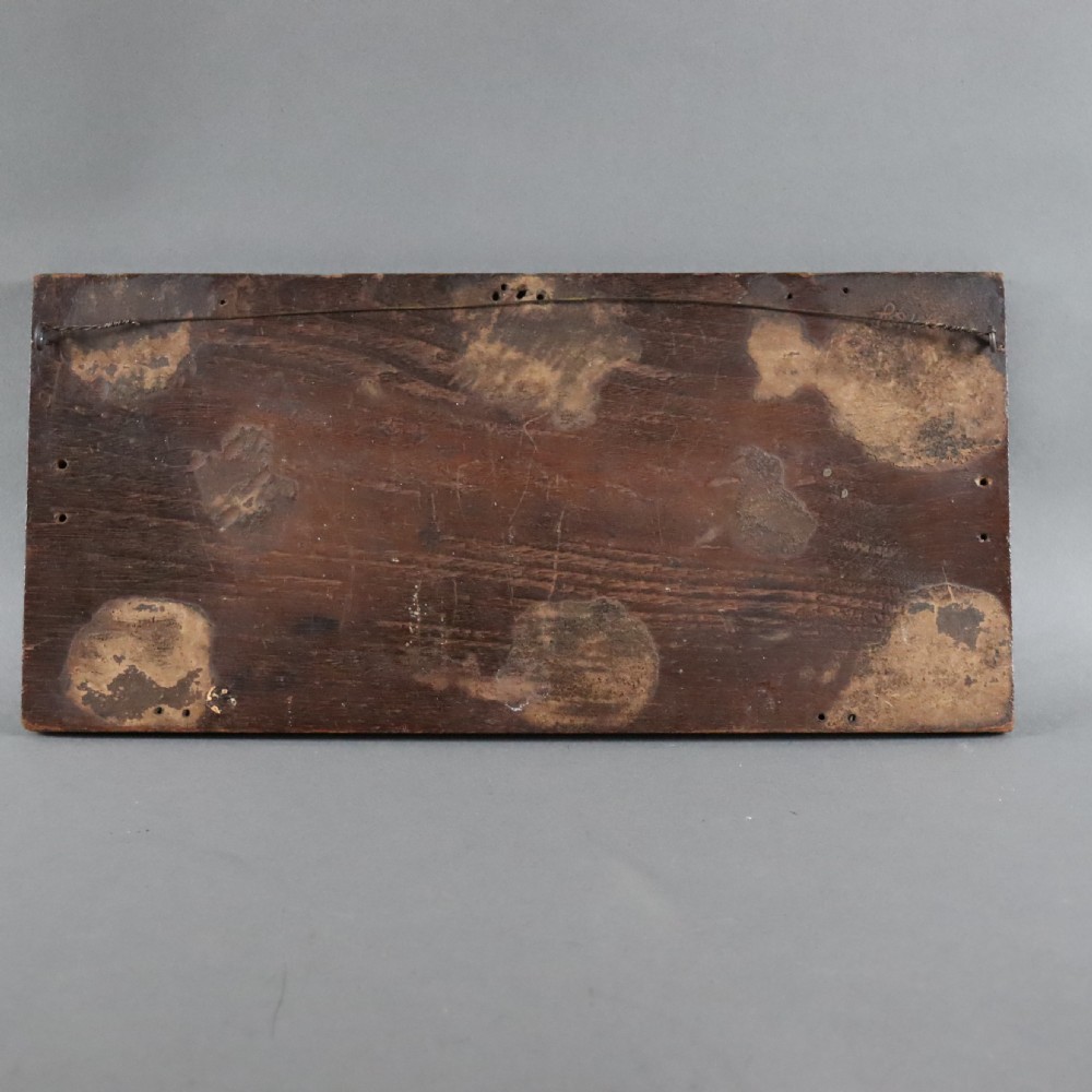 A 19th century carved walnut wall panel depicting a Wyvern or dragon View VI