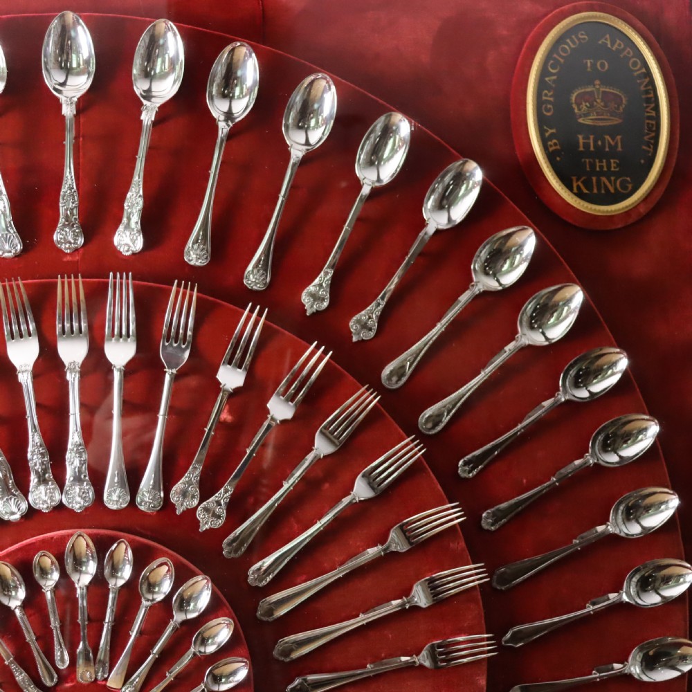 A Remarkable Bronze framed and glazed display of silver plate flat wear by Sheffield makers Roberts & Belk Ltd.  Circa 1920 View II