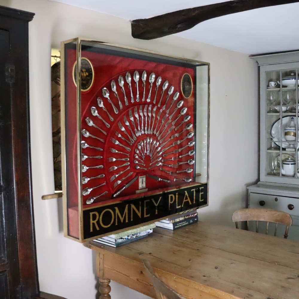A Remarkable Bronze framed and glazed display of silver plate flat wear by Sheffield makers Roberts & Belk Ltd.  Circa 1920