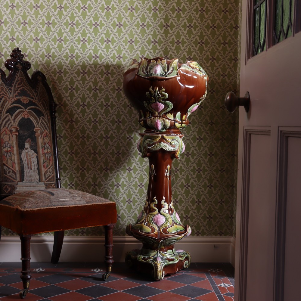 An Art Nouveau majolica jardiniere and stand. Circa1900  View II