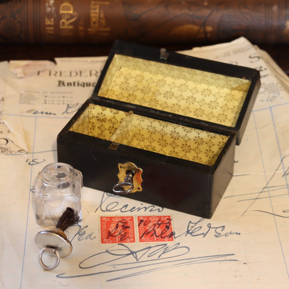 Leather covered stamp box and damper.  Circa 1900 View II