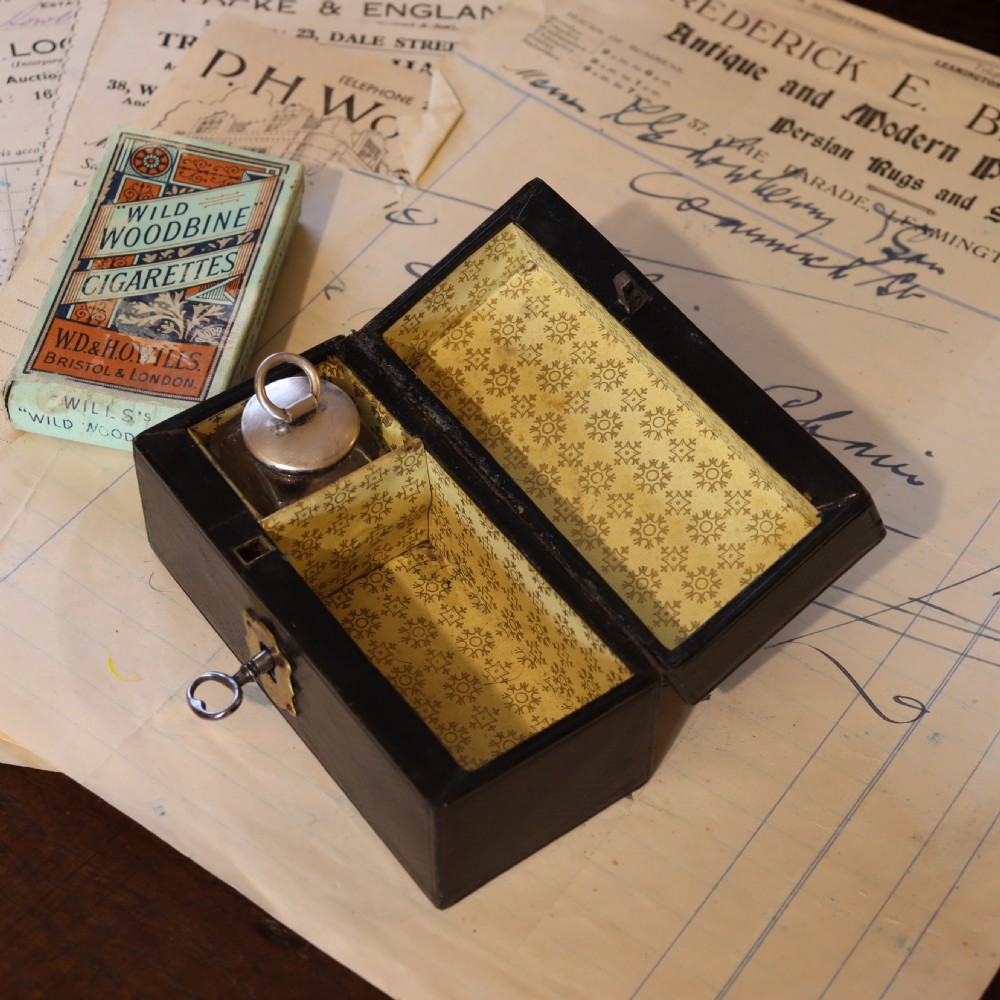 Leather covered stamp box and damper.  Circa 1900 View III