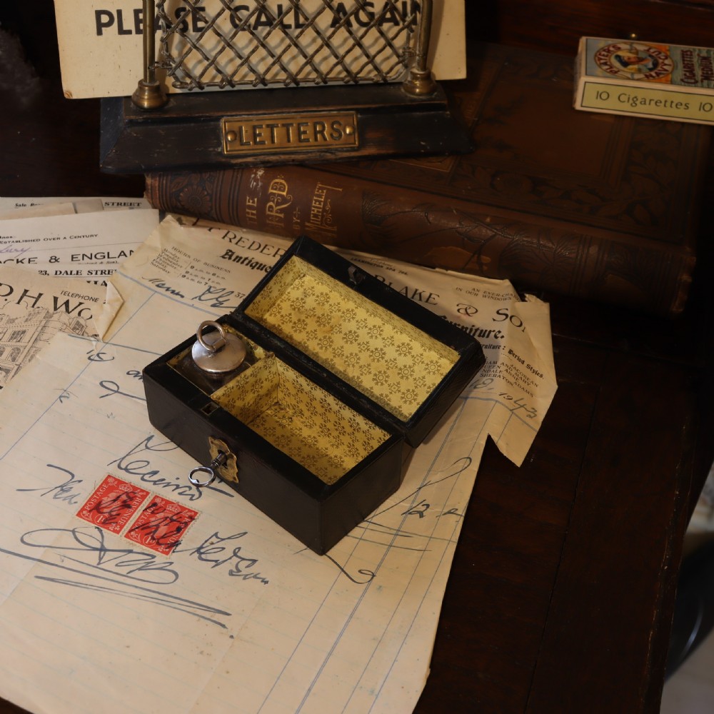 Leather covered stamp box and damper.  Circa 1900 View VI
