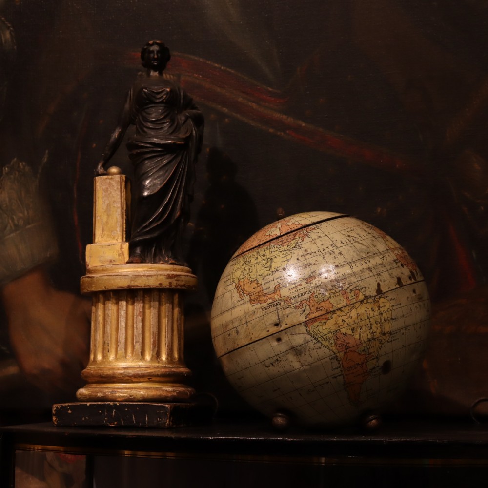 A Huntley and Palmers biscuit tin, in the form of a globe  View III