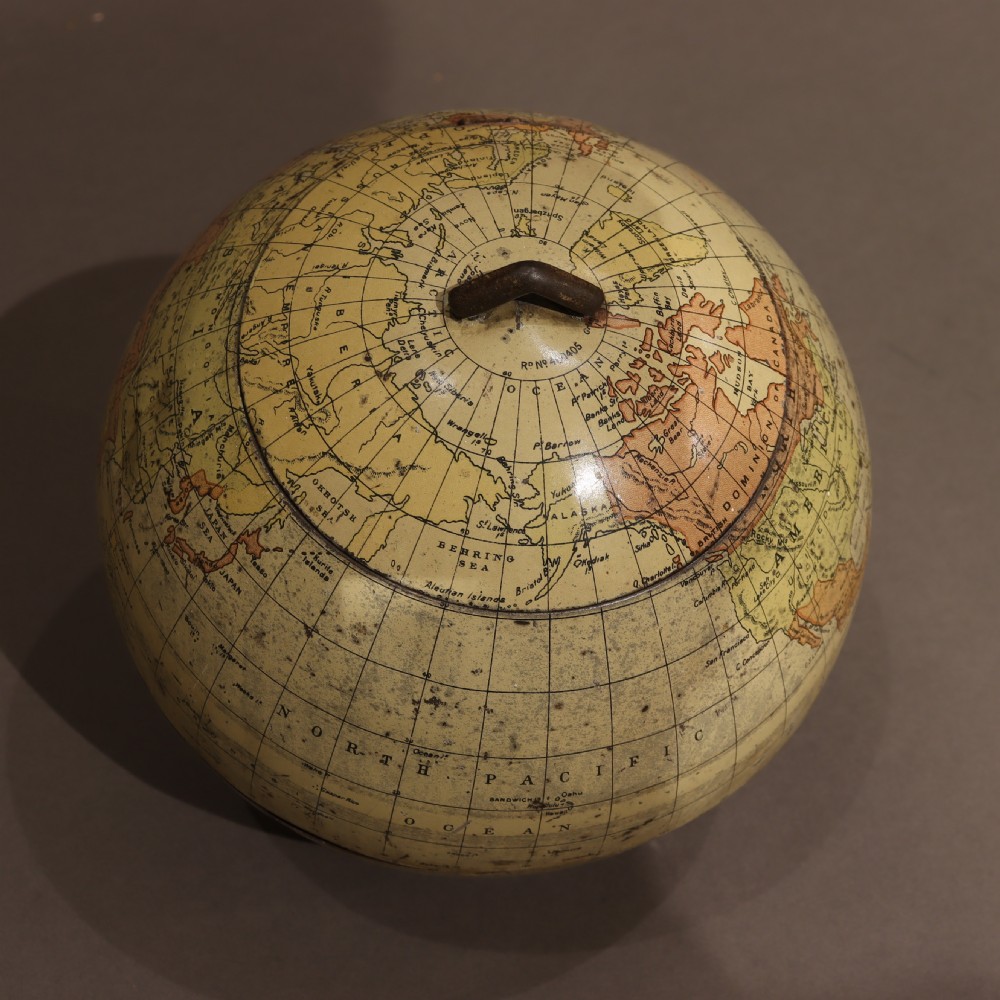 A Huntley and Palmers biscuit tin, in the form of a globe  View V