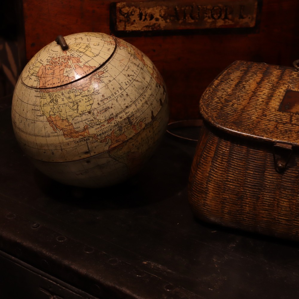 A Huntley and Palmers biscuit tin, in the form of a globe  View IX