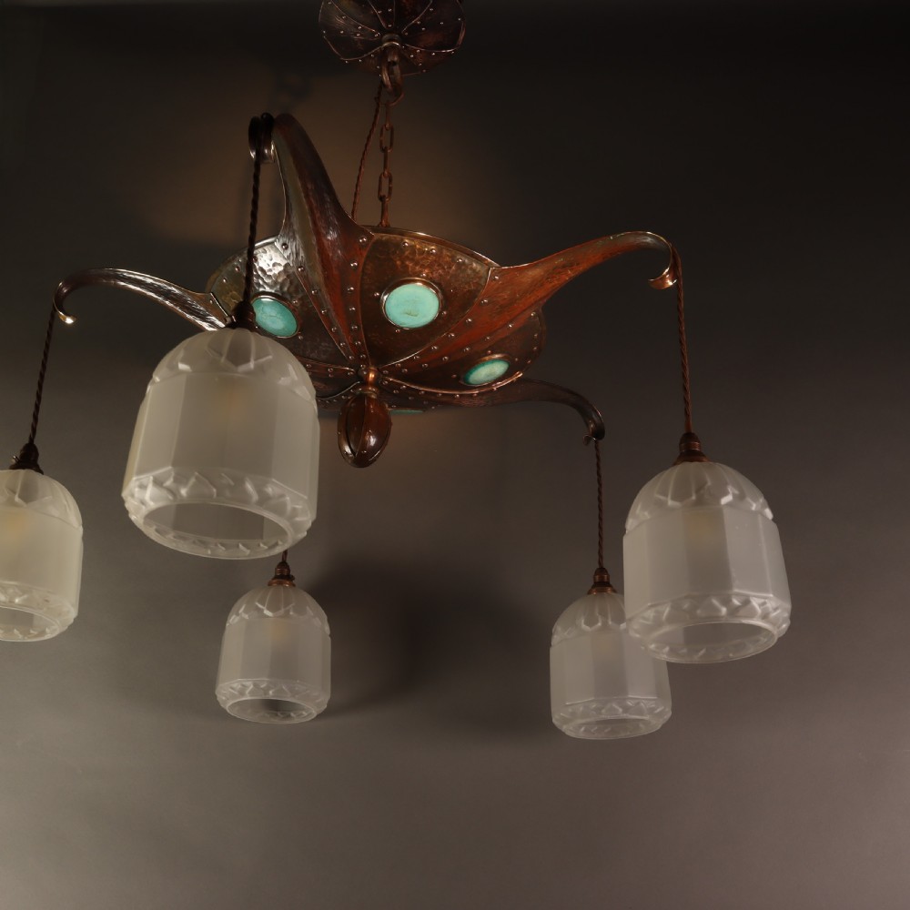 Remarkable Arts & Crafts hammered copper electrolier with Ruskin cabochons. Circa 1910 View II