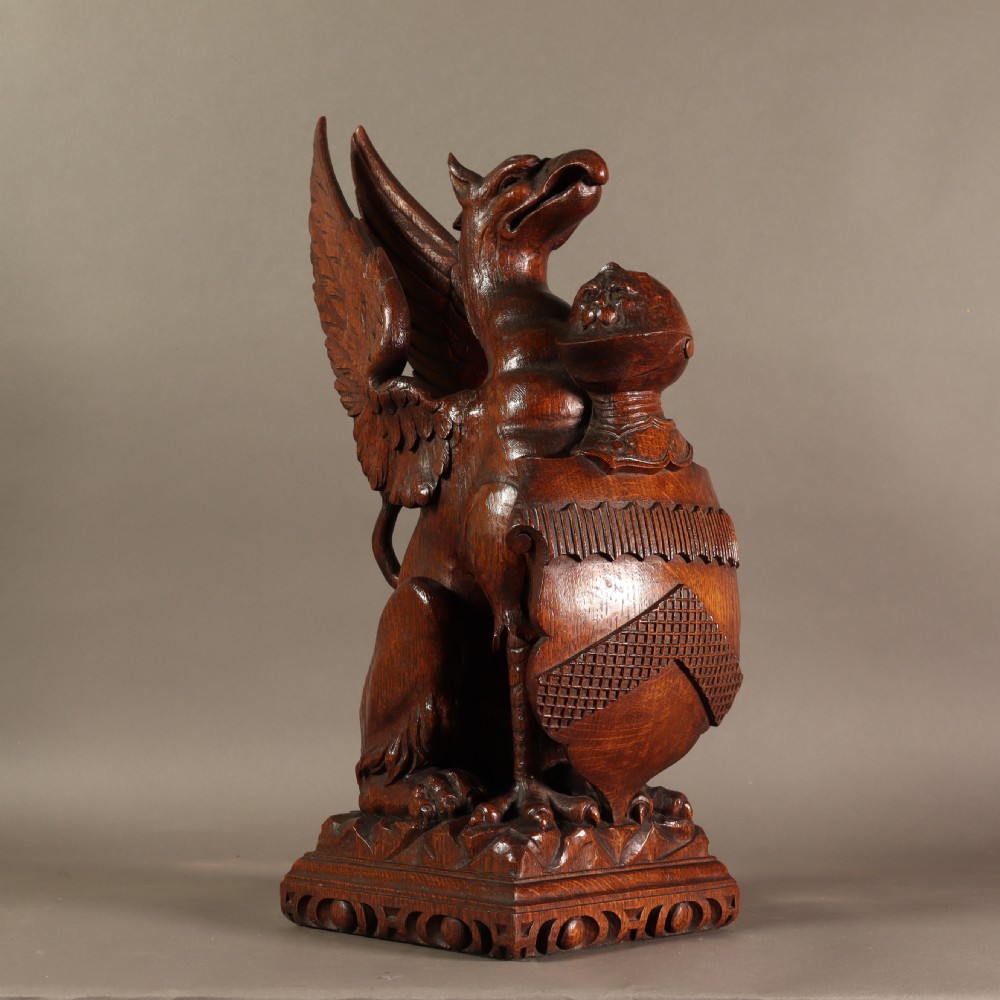 Impressive 19th Century Carved oak Griffin newel post displaying a family coat of arms