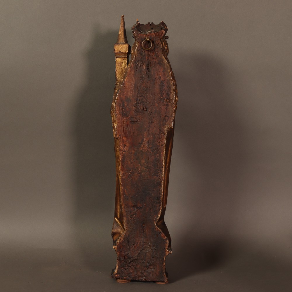A 17th-century German carved polychrome and giltwood sculpture depicting Saint Barbara holding a tower, standing upon an inscribed plinth. View VII