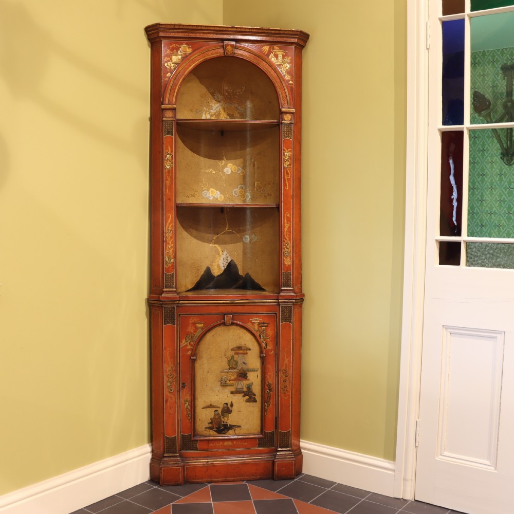 Red Japanned standing corner cupboard. Circa 1900