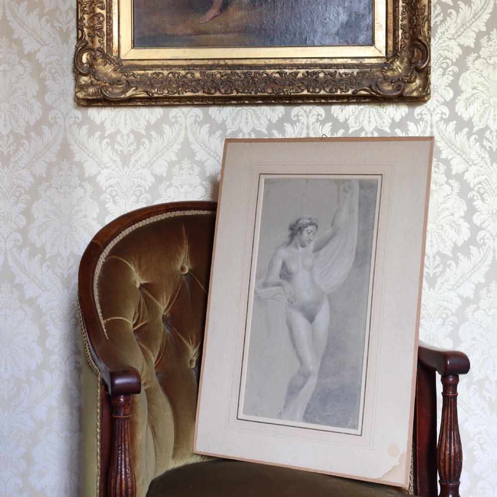 A 19th-century French academic study of a female nude figure drawn in black and white chalk on toned beige paper. View III