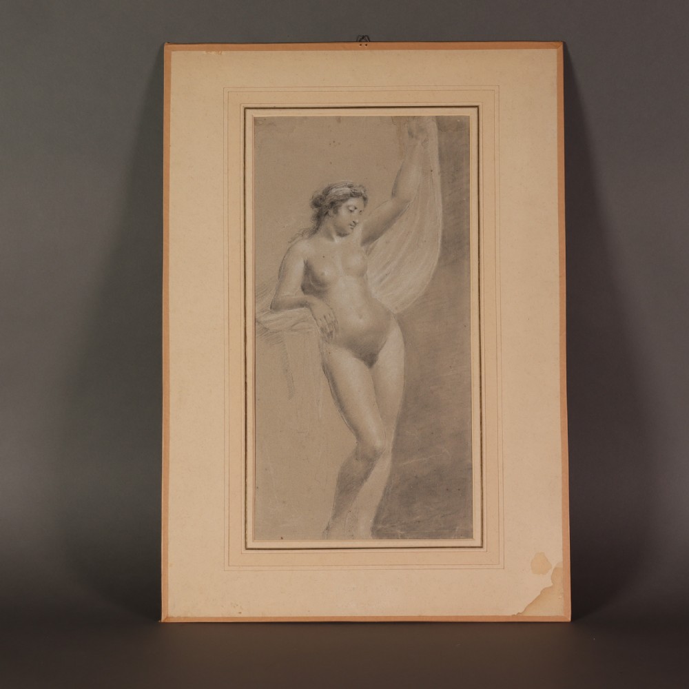 A 19th-century French academic study of a female nude figure drawn in black and white chalk on toned beige paper.