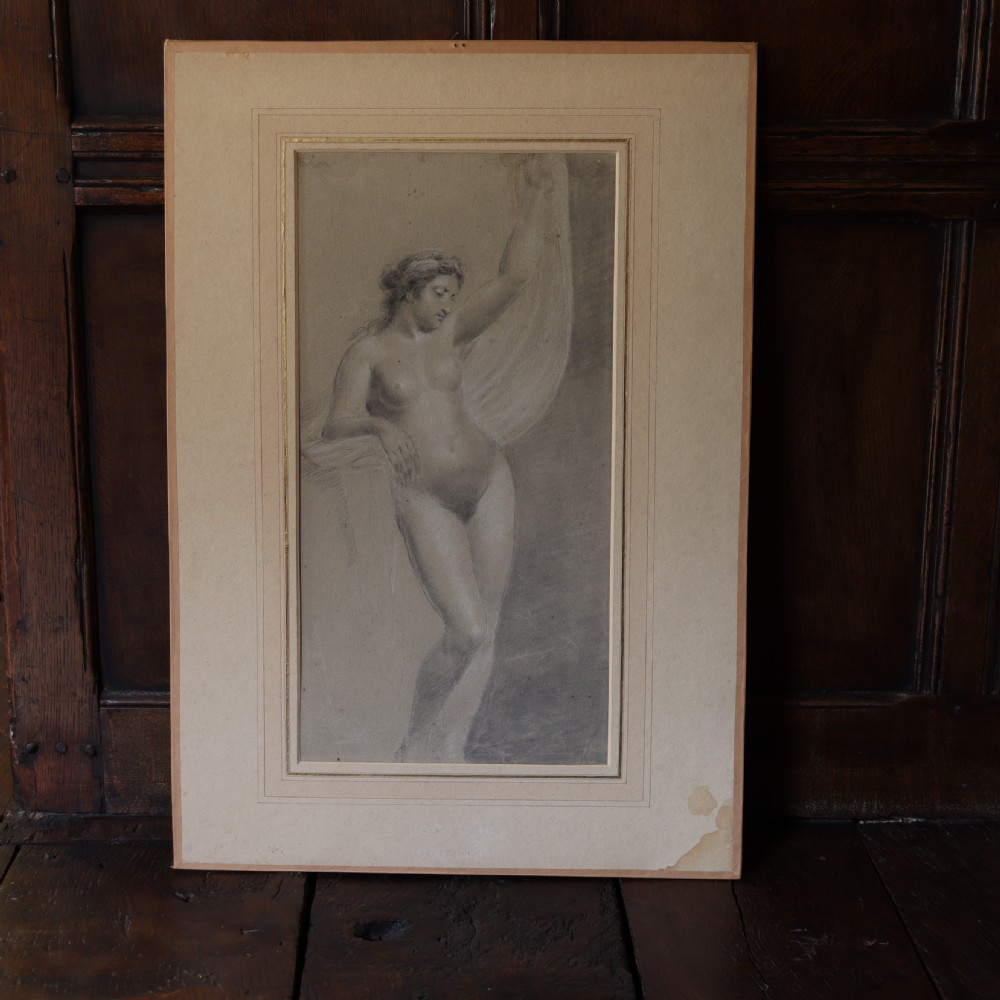 A 19th-century French academic study of a female nude figure drawn in black and white chalk on toned beige paper. View V