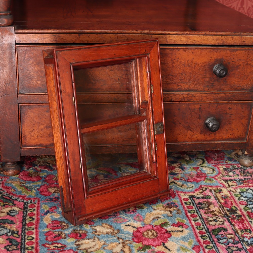 A 19th-century miniature mahogany sash window model featuring glazed panes and a polished timber frame. View II