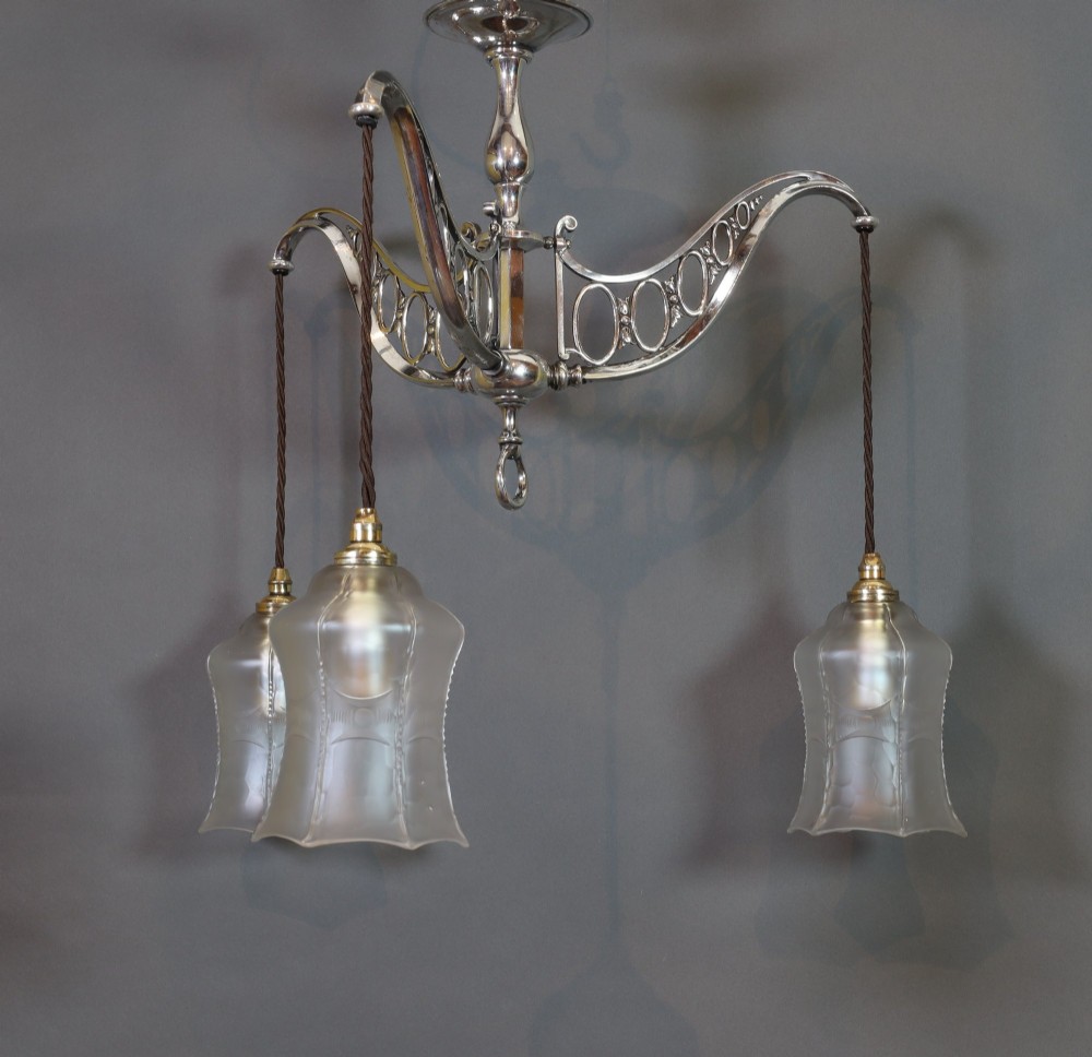 Three arm ceiling light with a great provenance. Circa 1910