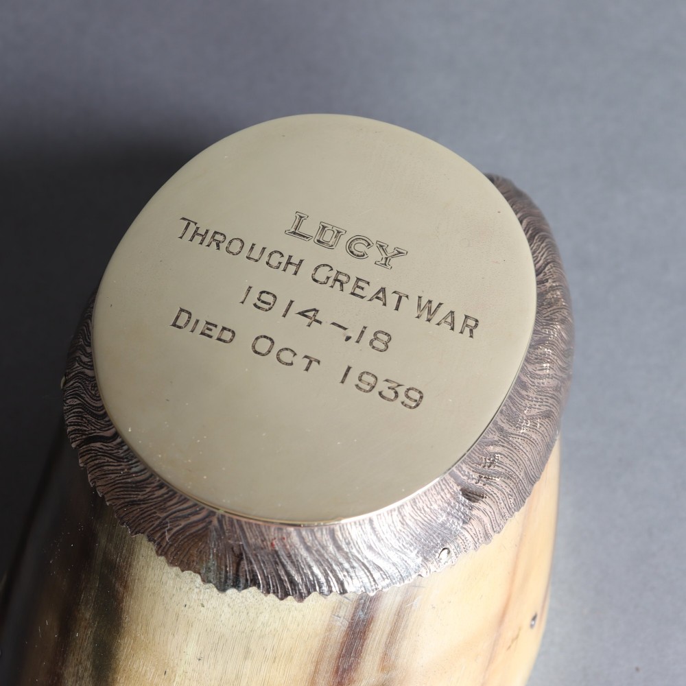 A preserved horse hoof mounted with an engraved brass top plate detailing military service dates and fitted with a polished brass rim around the base. View III