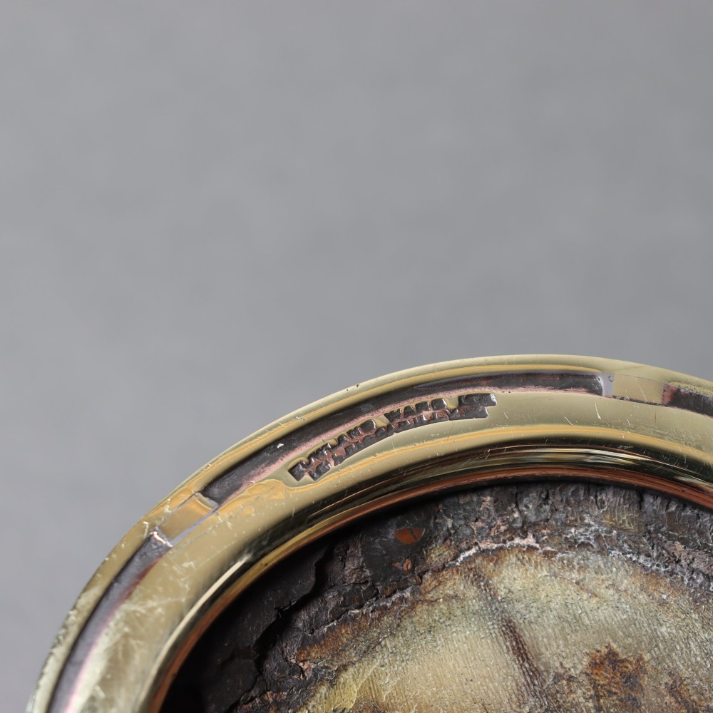 A preserved horse hoof mounted with an engraved brass top plate detailing military service dates and fitted with a polished brass rim around the base. View V