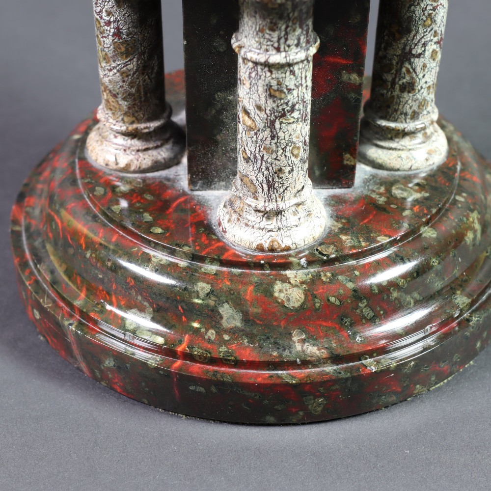 A late 19th-century carved Cornish serpentine stone model of an ecclesiastical font featuring an octagonal bowl supported by four turned columns on a circular base. View V