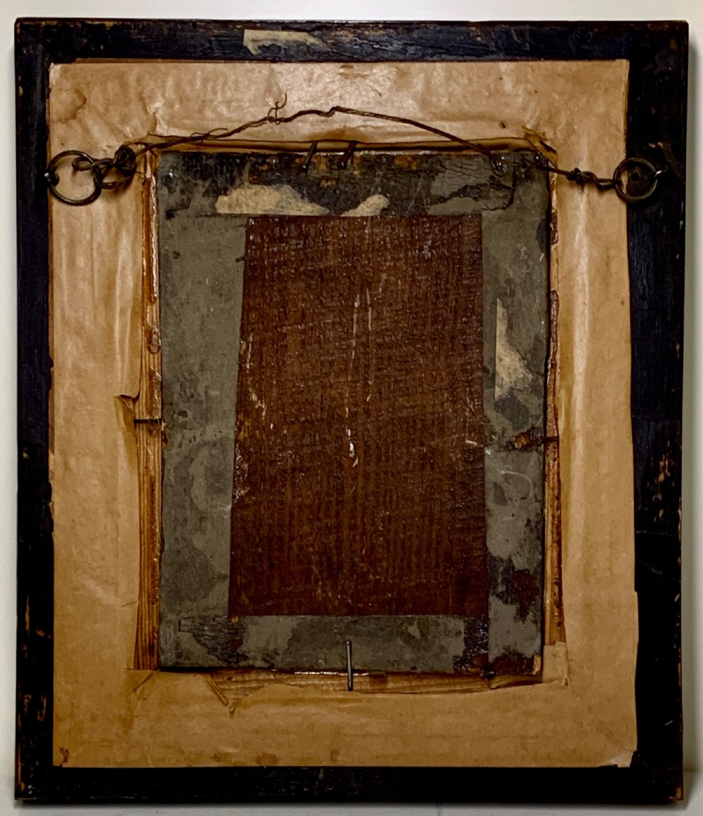An early 19th-century oil painting depicting a child with light hair wearing a lace collar, set inside a broad wooden frame with a thin gilded inner slip. View IV
