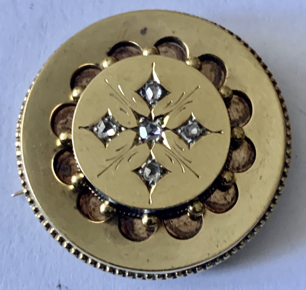 A Victorian Etruscan Diamond Set Brooch, of circular form View II