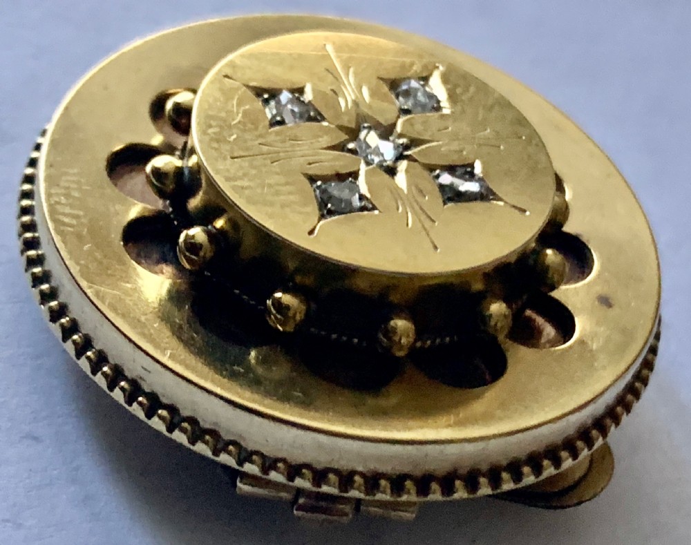 A Victorian Etruscan Diamond Set Brooch, of circular form View IV