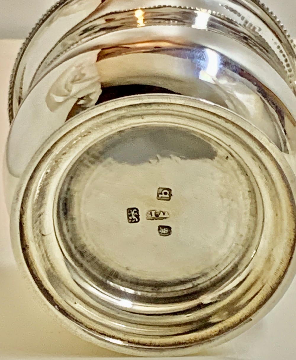 A sterling silver George III sugar bowl featuring a baluster form, beaded rim, and a circular pedestal foot. View II