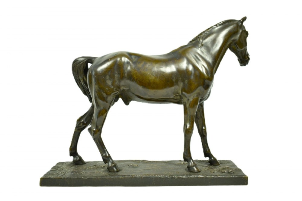 A dark brown patinated bronze sculpture of a standing horse positioned on an integral rectangular base. View III