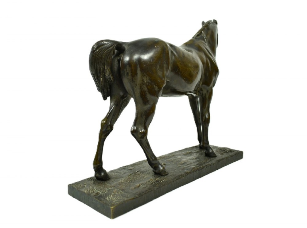 A dark brown patinated bronze sculpture of a standing horse positioned on an integral rectangular base. View IV