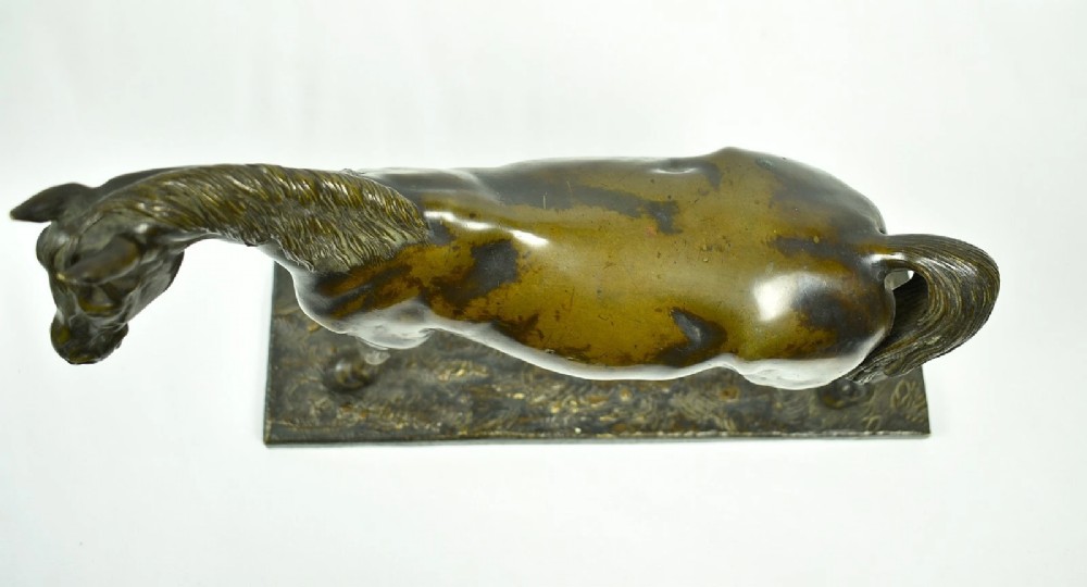 A dark brown patinated bronze sculpture of a standing horse positioned on an integral rectangular base. View VII
