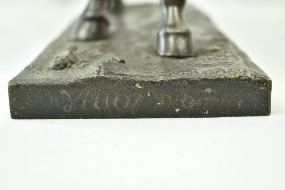 A dark brown patinated bronze sculpture of a standing horse positioned on an integral rectangular base. View X