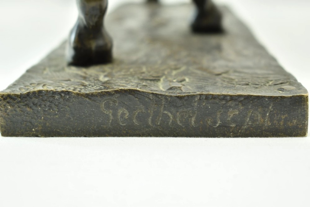 A dark brown patinated bronze sculpture of a standing horse positioned on an integral rectangular base. View XI