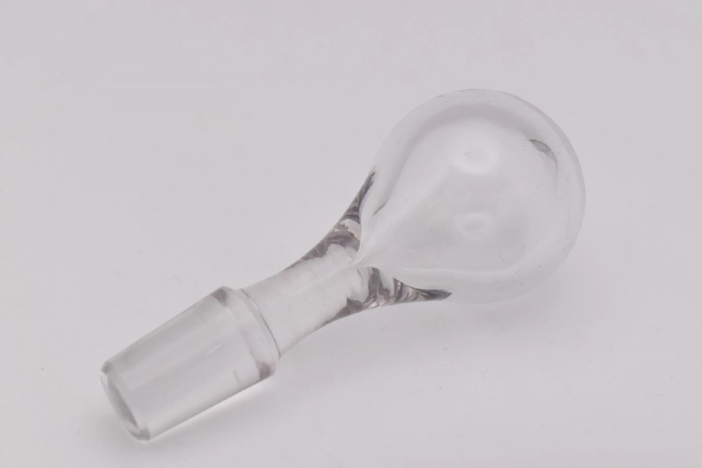 A pair of nineteenth-century clear crystal claret jugs featuring engraved silver mounts, tall necks, round stoppers, and silver handles shaped as entwined serpents. View IV