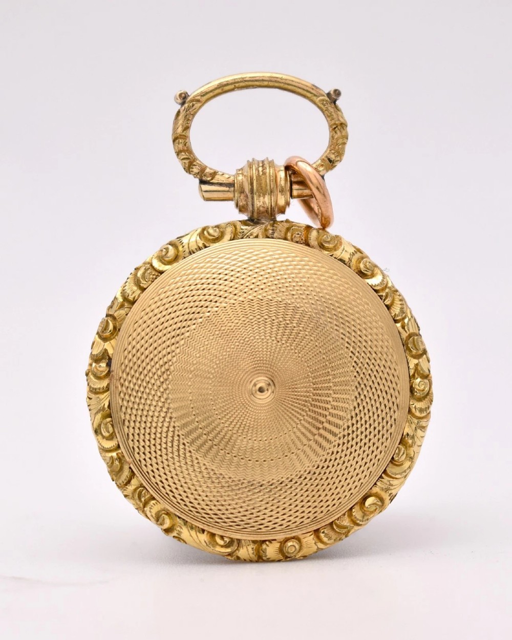 A circular gold locket pendant featuring a hand-painted portrait of a woman with dark hair against a light blue background. View V
