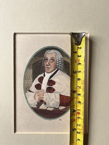 fig 6. An oval hand-coloured portrait etching of Sir William Nairne in full legal robes and wig, presented within a textured cream window mount.