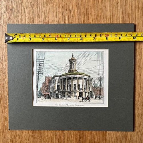fig 5. An 1891 hand-coloured wood engraving by Edward Whymper depicting the Merchants Exchange building in Philadelphia set within a dark grey mount.