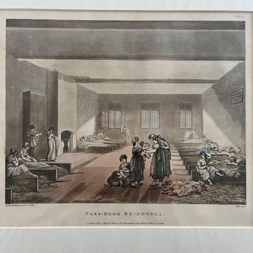 fig 1. A mounted 1808 hand-coloured aquatint print by Rowlandson and Pugin depicting the Pass-Room at Bridewell with figures in a large interior space.
