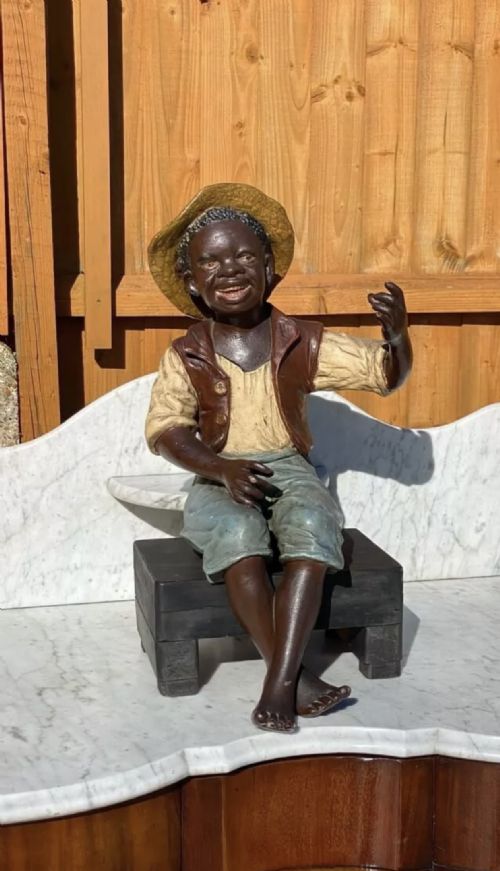 19th Century Large Bretby Terracotta Boy Sitting on a Stool