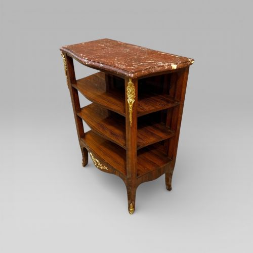 fig 1. A French Louis XV style rosewood open side cabinet featuring a red marble top, three tiered shelves, and decorative brass ormolu mounts.
