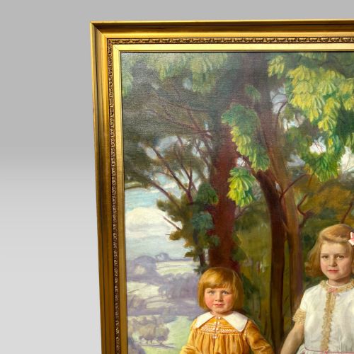 fig 2. A full-length 1920s oil painting depicting two young children in a landscape setting, housed within a gilded wooden frame.