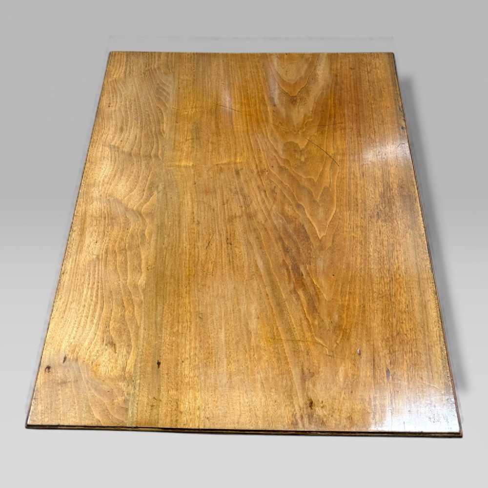 An antique walnut coffee table featuring turned legs, a rectangular top, brass drop handles, and an H-stretcher base. View VIII