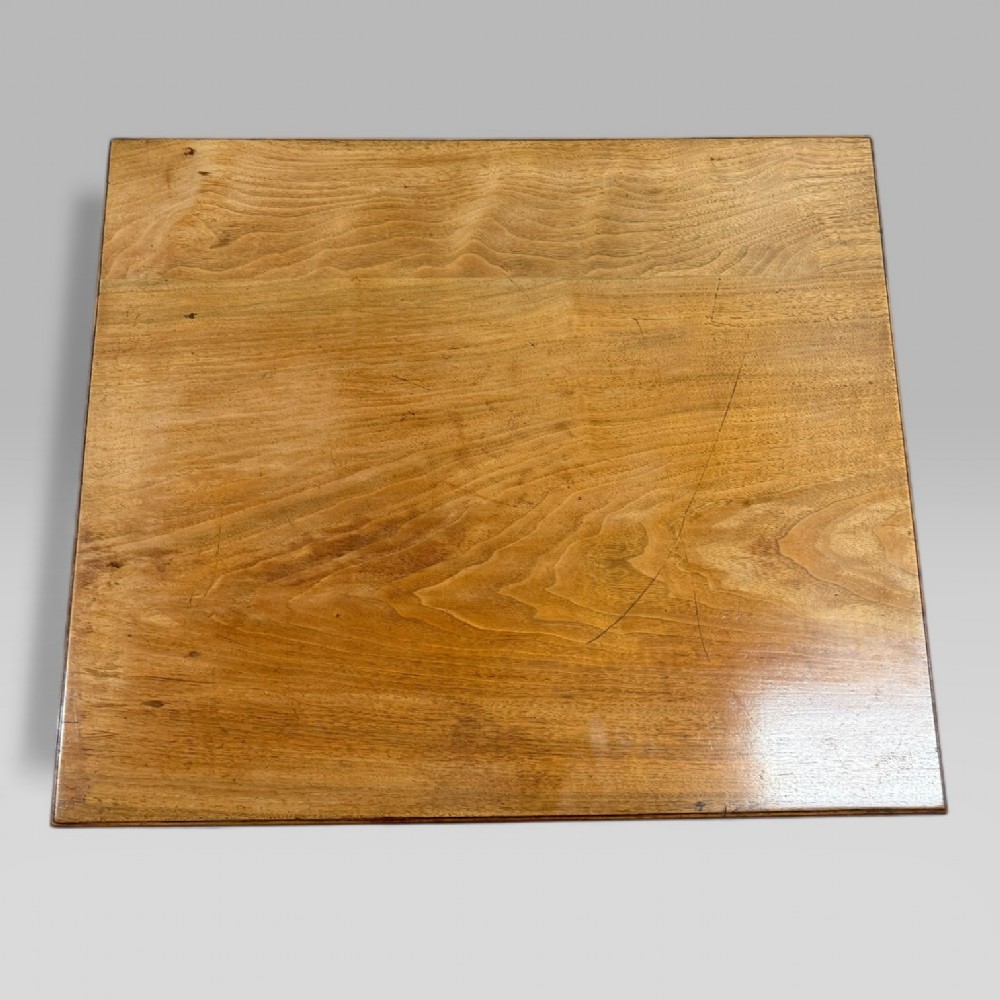 An antique walnut coffee table featuring turned legs, a rectangular top, brass drop handles, and an H-stretcher base. View XIII