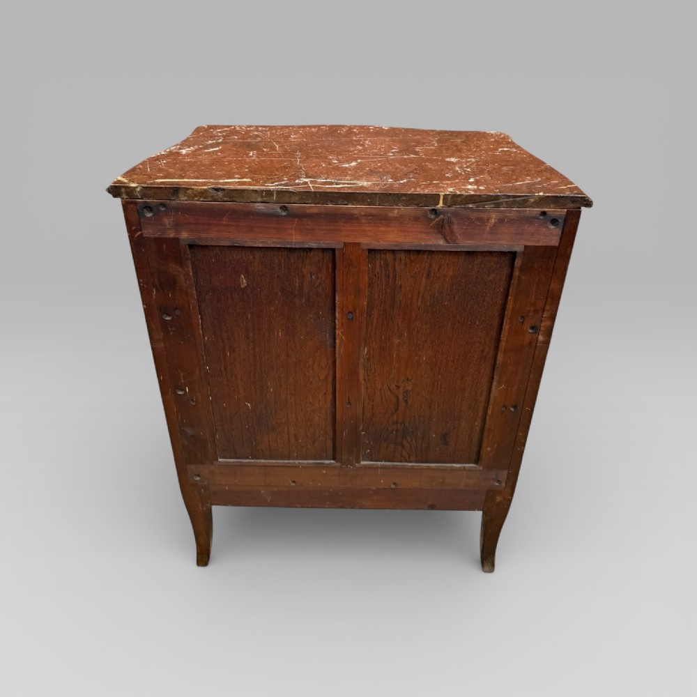 A French Louis XV style rosewood open side cabinet featuring a red marble top, three tiered shelves, and decorative brass ormolu mounts. View XI