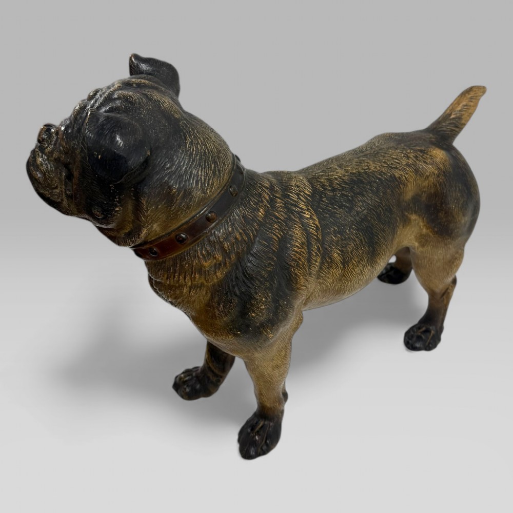 A life-size antique Austrian terracotta sculpture of a standing pug dog with inset glass eyes and a moulded collar. View VIII