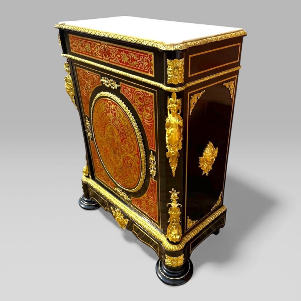 A French Napoleon III ebonised pier cabinet featuring red tortoiseshell and brass Boulle marquetry, gilt bronze mounts, and a white marble top. View III