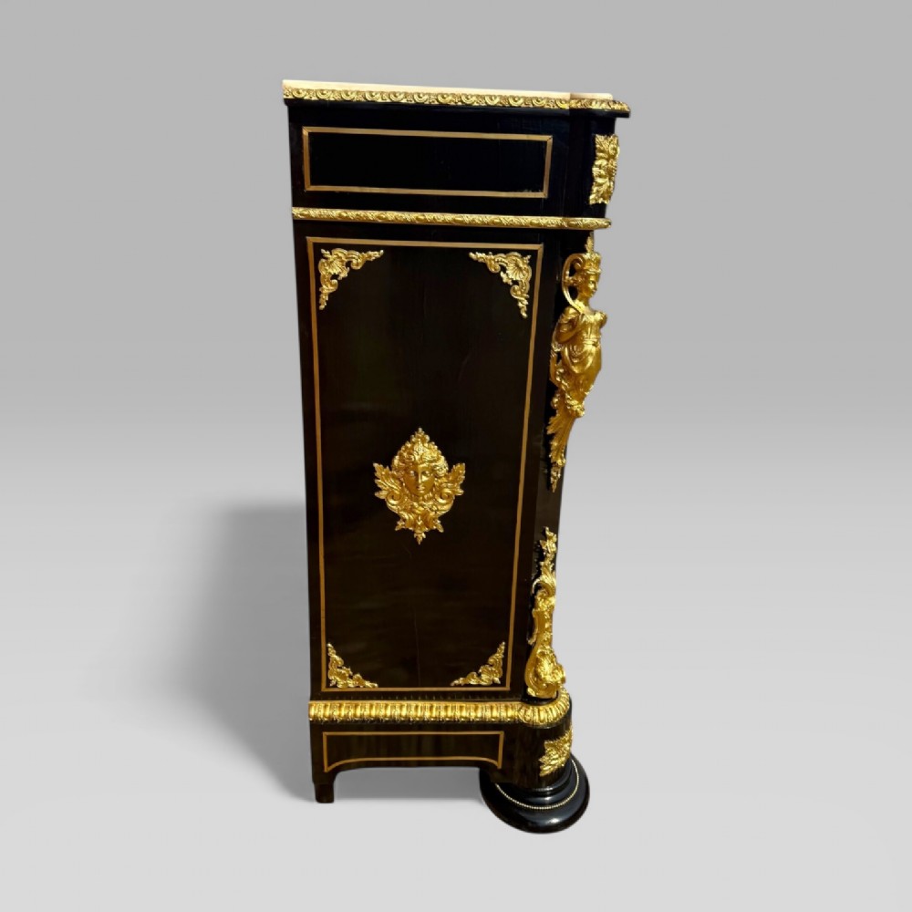 A French Napoleon III ebonised pier cabinet featuring red tortoiseshell and brass Boulle marquetry, gilt bronze mounts, and a white marble top. View VIII