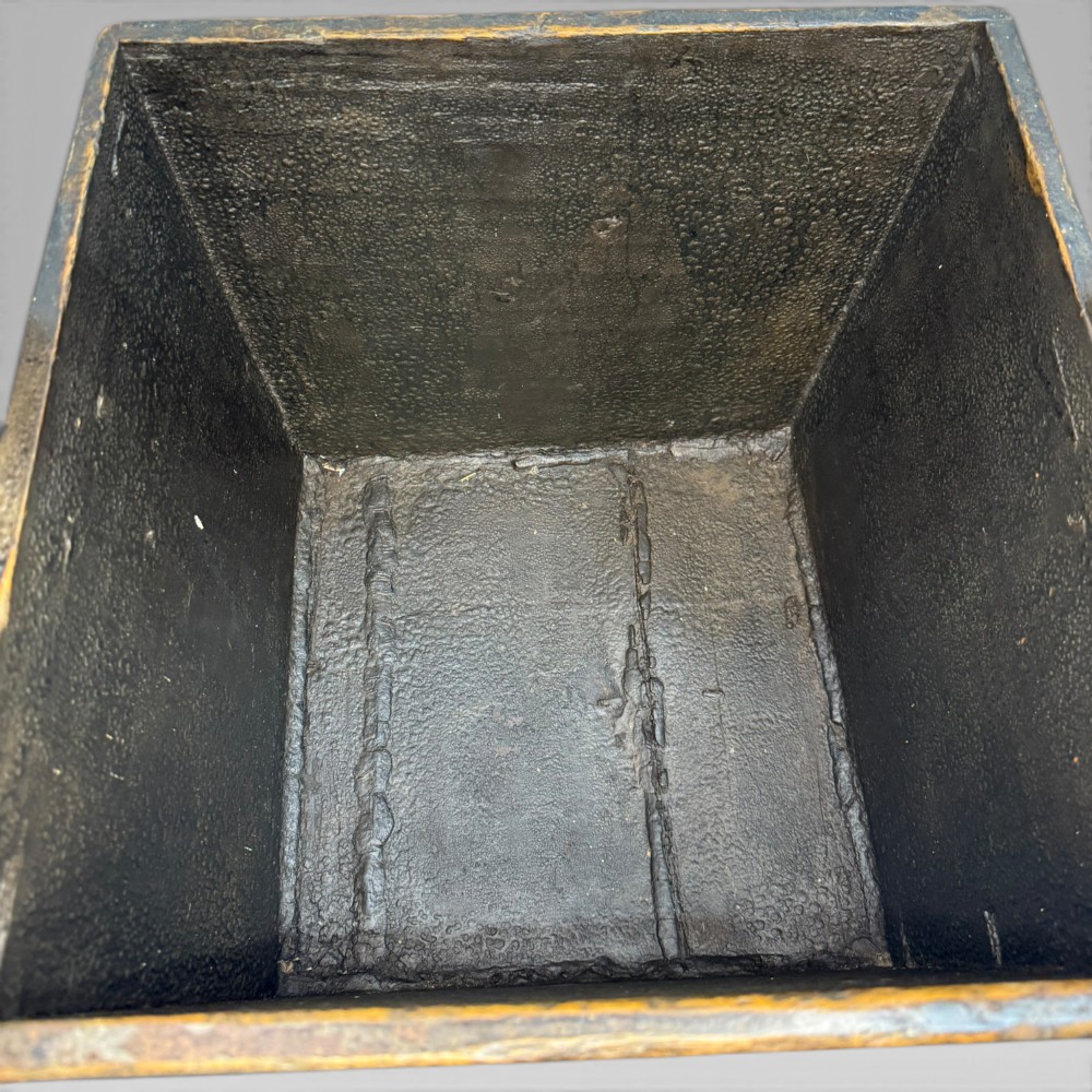 An antique dark brown Chinese elm harvest bucket featuring a tapered square body and a high wooden carrying handle with mortise and tenon joinery. View VI