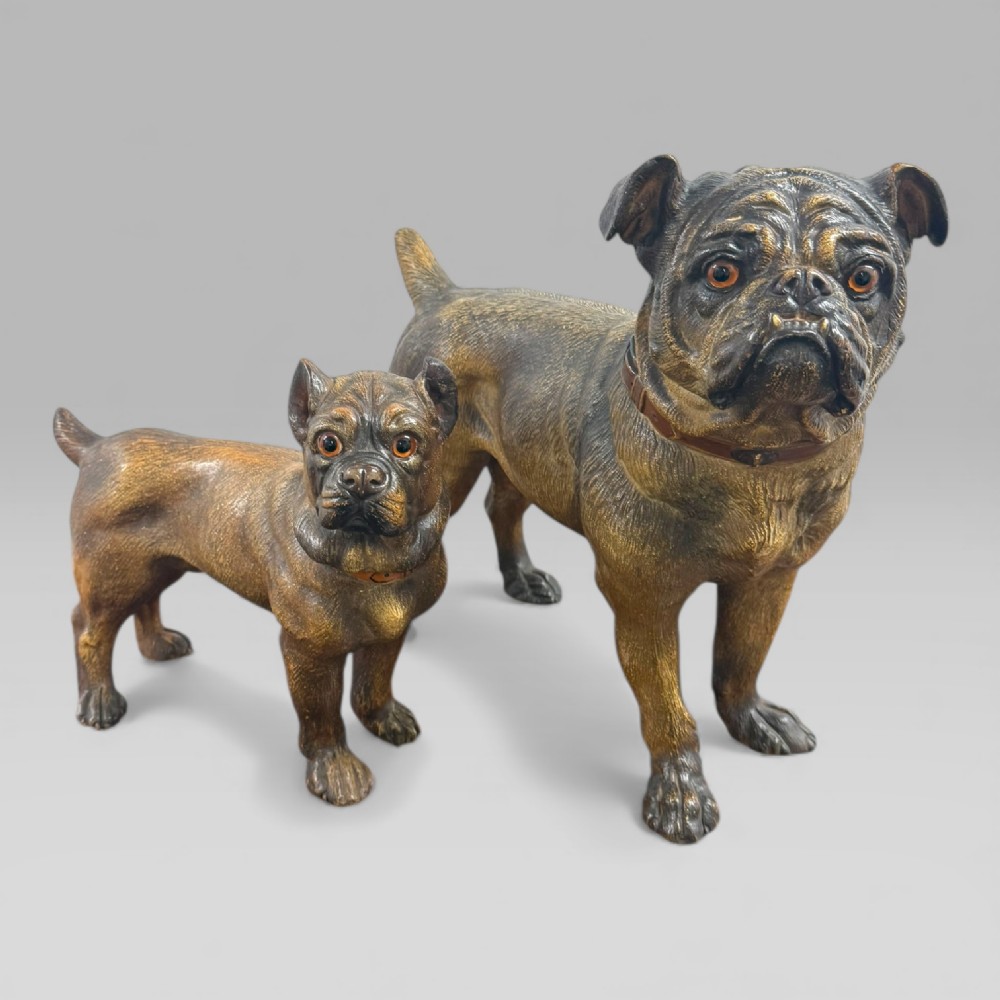 A life-size antique Austrian terracotta sculpture of a standing pug dog with inset glass eyes and a moulded collar. View III