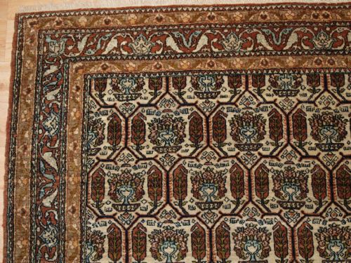 fig 1. ANTIQUE ISFAHAN RUG WITH ALL OVER REPEAT DESIGN, CIRCA 1910.