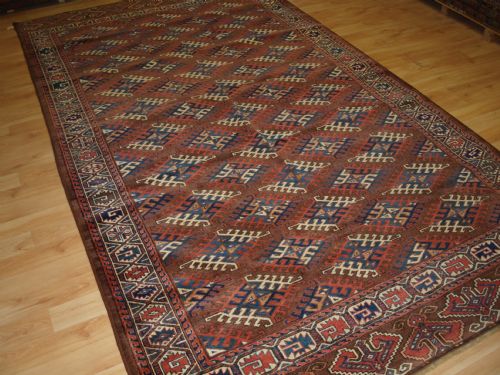 Antique Yomut Turkmen Main Carpet with Dyrnak Gul Design, Curl Leaf Border, Late 19th Century.